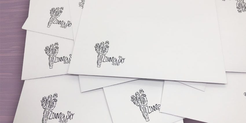 envelope white zinnia sky studio